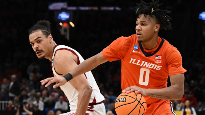 Mar 28, 2024; Boston, MA, USA; Illinois Fighting Illini guard Terrence Shannon Jr. (0) dribbles the