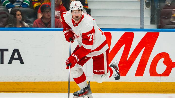 Detroit Red Wings forward Dylan Larkin (71) handles the puck against the Vancouver Canucks in the first period at Rogers Arena.  Mandatory Credit: Bob Frid-Imagn Images