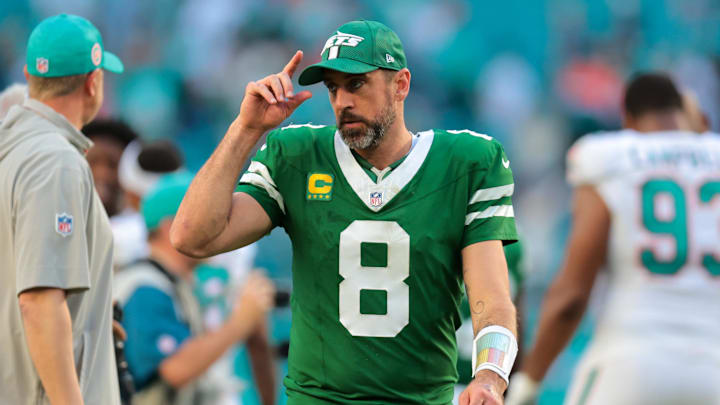  New York Jets quarterback Aaron Rodgers (8) reacts from the field after the game against the Miami Dolphins at Hard Rock Stadium. 