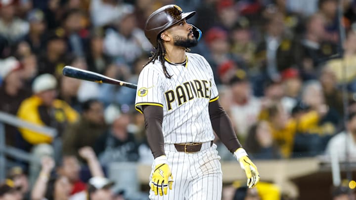 May 13, 2025; San Diego, California, USA; San Diego Padres right fielder Fernando Tatis Jr. (23) flips his bat after hitting a walk-off two run home run during the ninth inning against the Los Angeles Angels at Petco Park. Mandatory Credit: David Frerker-Imagn Images