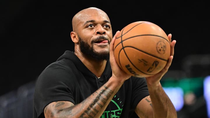 Dec 11, 2025; Milwaukee, Wisconsin, USA;  Boston Celtics center Xavier Tillman (26) warms up before the game against the Milwaukee Bucks at Fiserv Forum. Mandatory Credit: Benny Sieu-Imagn Images