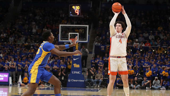 Jan 18, 2025; Pittsburgh, Pennsylvania, USA; Clemson Tigers forward Ian Schieffelin (4) shoots a three point basket against the Pittsburgh Panthers during the first half at the Petersen Events Center. 