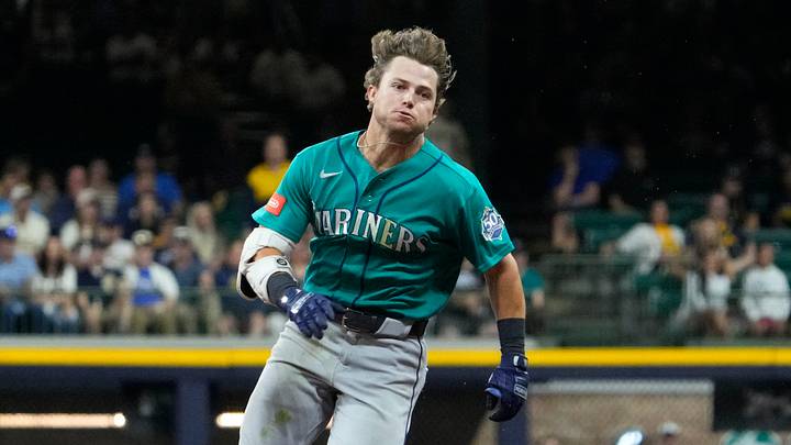 Aug 19, 2026; Milwaukee, Wisconsin, USA; Seattle Mariners second baseman Brock Rodden (90) runs after hitting a triple against the Milwaukee Brewers in the eighth inning at American Family Field. Mandatory Credit: Michael McLoone-Imagn Images