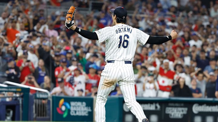 Mar 21, 2023; Miami, Florida, USA; Japan designated hitter and closing pitcher Shohei Ohtani (16) pitches against the the USA during the ninth inning at LoanDepot Park. Mandatory Credit: Rhona Wise-Imagn Images
