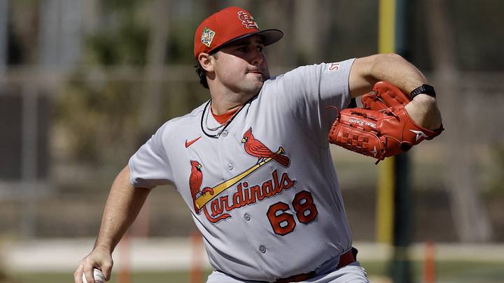 Feb 16, 2026; Jupiter, FL, USA; St. Louis Cardinals pitching prospect Max Rajcic (68) throws a pitch during spring training workouts at Roger Dean Stadium. Mandatory Credit: Reinhold Matay-Imagn Images Feb 16, 2026; Jupiter, FL, USA; St. Louis Cardinals pitching prospect Max Rajcic (68) throws a pitch during spring training workouts at Roger Dean Stadium. Mandatory Credit: Reinhold Matay-Imagn Images