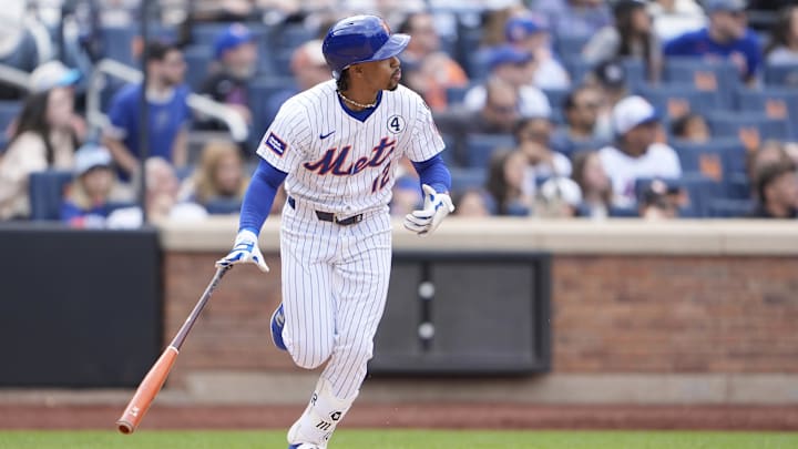Jun 1, 2025; New York City, New York, USA; New York Mets shortstop Francisco Lindor (12) watches his home run against the Colorado Rockies during the fifth inning at Citi Field. Mandatory Credit: Gregory Fisher-Imagn Images