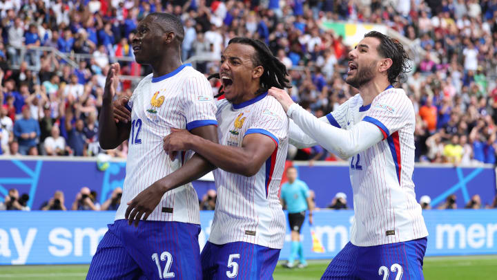 France are through by the skin of their teeth