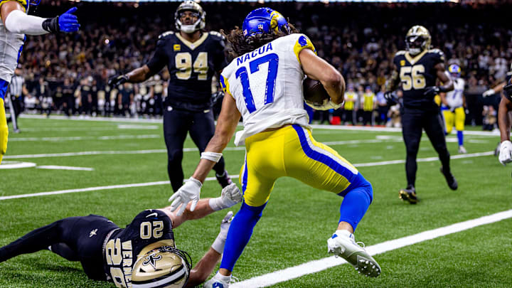 Rams wide receiver Puka Nacua rushes in for a touchdown against New Orleans Saints linebacker Pete Werner (20) during the second half at Caesars Superdome. Mandatory Credit: Stephen Lew-Imagn Images Rams wide receiver Puka Nacua rushes in for a touchdown against New Orleans Saints linebacker Pete Werner (20) during the second half at Caesars Superdome. Mandatory Credit: Stephen Lew-Imagn Images