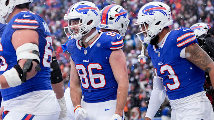 Buffalo Bills tight end Dalton Kincaid celebrates scoring a touchdown against the Cincinnati Bengals.
