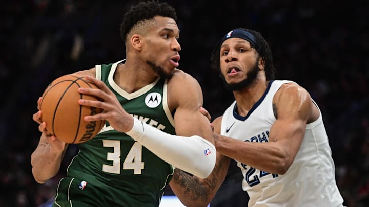 Apr 3, 2024; Milwaukee, Wisconsin, USA; Milwaukee Bucks forward Giannis Antetokounmpo (34) drives for the basket against Memphis Grizzlies forward Lamar Stevens (24) in the fourth quarter at Fiserv Forum. Mandatory Credit: Benny Sieu-Imagn Images