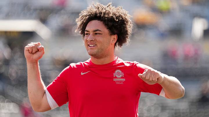 Ohio State Buckeyes quarterback Luke Fahey (13) warms up during the NCAA football game against the Iowa Hawkeyes at Kinnick Stadium in Iowa City on Oct. 3, 2026. Ohio State Buckeyes quarterback Luke Fahey (13) warms up during the NCAA football game against the Iowa Hawkeyes at Kinnick Stadium in Iowa City on Oct. 3, 2026.