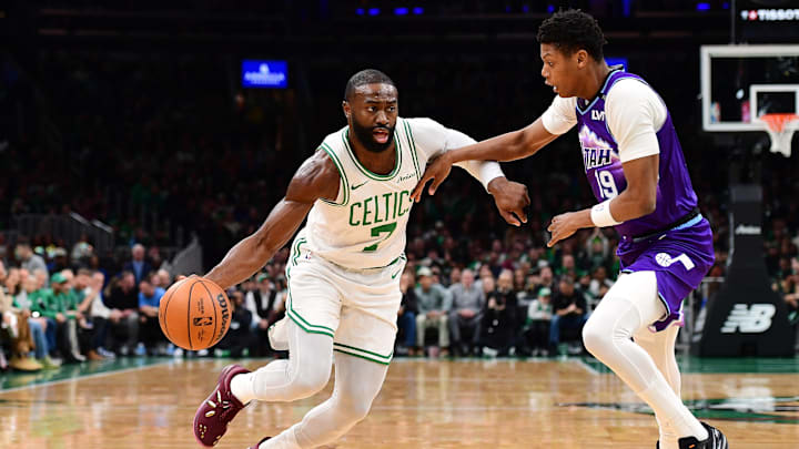 Nov 3, 2025; Boston, Massachusetts, USA; Boston Celtics guard Jaylen Brown (7) controls the ball while Utah Jazz guard Ace Bailey (19) defends during the first half at TD Garden. Mandatory Credit: Bob DeChiara-Imagn Images