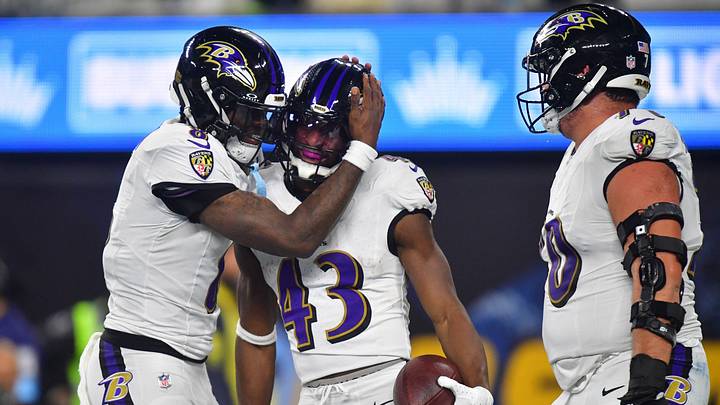 Nov 25, 2024; Inglewood, California, USA; Baltimore Ravens running back Justice Hill (43) celebrates his touchdown scored against the Los Angeles Chargers with offensive tackle Roger Rosengarten (70) and quarterback Lamar Jackson (8) during the second half at SoFi Stadium. Mandatory Credit: Gary A. Vasquez-Imagn Images Nov 25, 2024; Inglewood, California, USA; Baltimore Ravens running back Justice Hill (43) celebrates his touchdown scored against the Los Angeles Chargers with offensive tackle Roger Rosengarten (70) and quarterback Lamar Jackson (8) during the second half at SoFi Stadium. Mandatory Credit: Gary A. Vasquez-Imagn Images