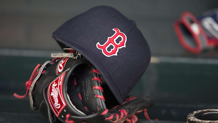 May 14, 2014; Minneapolis, MN, USA; A general view of a glove and Boston Red Sox hat in the dugout prior to a game between the Boston Red Sox and Minnesota Twins at Target Field. Mandatory Credit: Jesse Johnson-Imagn Images May 14, 2014; Minneapolis, MN, USA; A general view of a glove and Boston Red Sox hat in the dugout prior to a game between the Boston Red Sox and Minnesota Twins at Target Field. Mandatory Credit: Jesse Johnson-Imagn Images