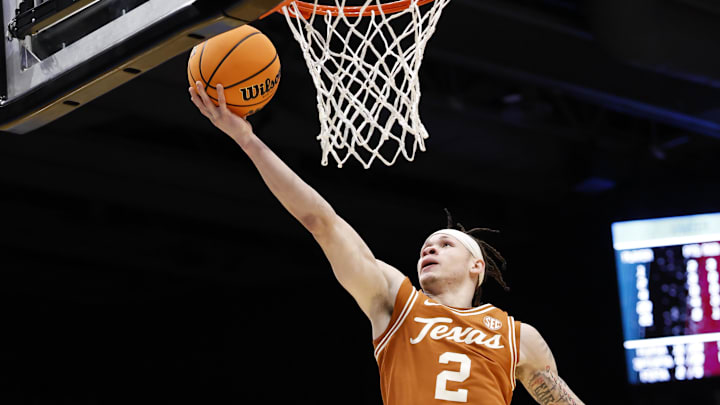Mar 19, 2025; Dayton, OH, USA; Texas Longhorns guard Chendall Weaver (2) shoots the ball in the first half against the Xavier Musketeers at UD Arena. 