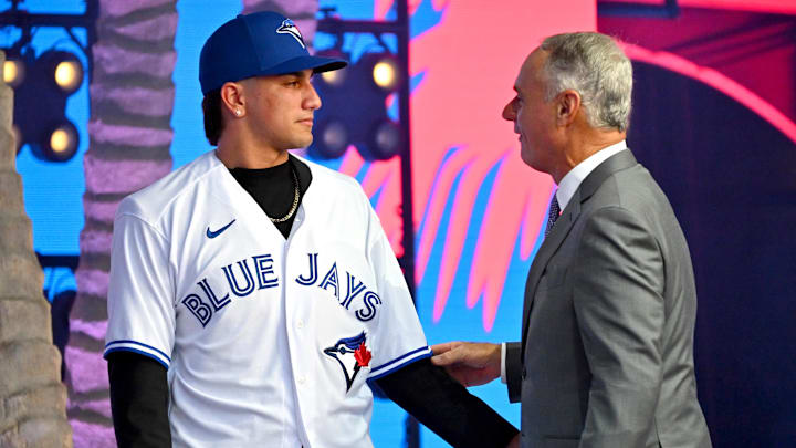 Jul 17, 2022; Los Angeles, CA, USA;  Brandon Barriera is congratulated by Rob Manfred, commissioner