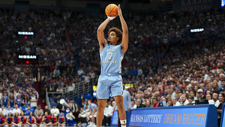 Nov 8, 2024; Lawrence, Kansas, USA; North Carolina Tar Heels guard Seth Trimble (7) shoots the ball during the first half against the Kansas Jayhawks at Allen Fieldhouse. Mandatory Credit: Jay Biggerstaff-Imagn Images