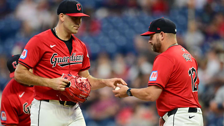 Sep 16, 2024; Cleveland, Ohio, USA; Cleveland Guardians manager Stephen Vogt (12) relieves starting pitcher Matthew Boyd (16) during the third inning against the Minnesota Twins at Progressive Field. Mandatory Credit: Ken Blaze-Imagn Images