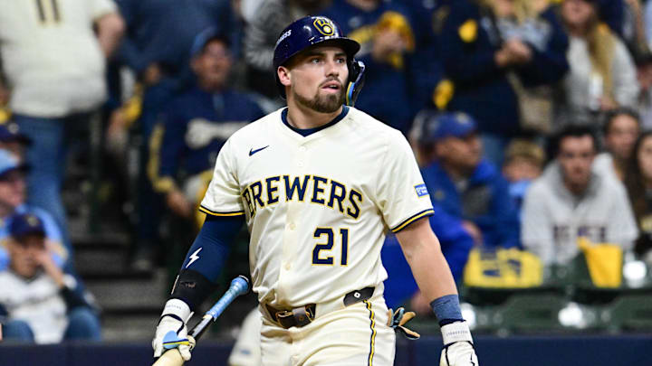 Oct 14, 2025; Milwaukee, Wisconsin, USA; Milwaukee Brewers third baseman Caleb Durbin (21) reacts after striking out against the Los Angeles Dodgers in the fourth inning during game two of the NLCS round for the 2025 MLB playoffs at American Family Field. Mandatory Credit: Benny Sieu-Imagn Images