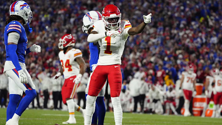 Nov 17, 2024; Orchard Park, New York, USA; Kansas City Chiefs wide receiver Xavier Worthy (1) signals a first down against the Buffalo Bills during the first half at Highmark Stadium. Mandatory Credit: Gregory Fisher-Imagn Images
