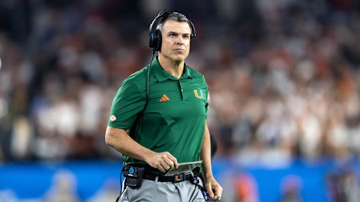 Jan 8, 2026; Glendale, AZ, USA; Miami Hurricanes head coach Mario Cristobal against the Mississippi Rebels during the 2026 Fiesta Bowl and semifinal game of the College Football Playoff at State Farm Stadium. Mandatory Credit: Mark J. Rebilas-Imagn Images