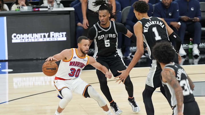 Golden State Warriors guard Stephen Curry (30) dribbles in front of San Antonio Spurs guard Stephon Castle (5) and center Victor Wembanyama (1) in the second half at Frost Bank Center. Mandatory Credit: Daniel Dunn-Imagn Images Golden State Warriors guard Stephen Curry (30) dribbles in front of San Antonio Spurs guard Stephon Castle (5) and center Victor Wembanyama (1) in the second half at Frost Bank Center. Mandatory Credit: Daniel Dunn-Imagn Images
