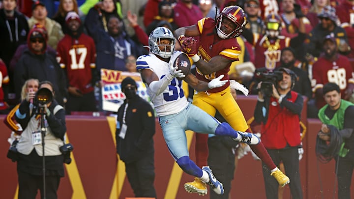 Dallas Cowboys cornerback Josh Butler breaks up a pass intended for Washington Commanders wide receiver Noah Brown. Dallas Cowboys cornerback Josh Butler breaks up a pass intended for Washington Commanders wide receiver Noah Brown.