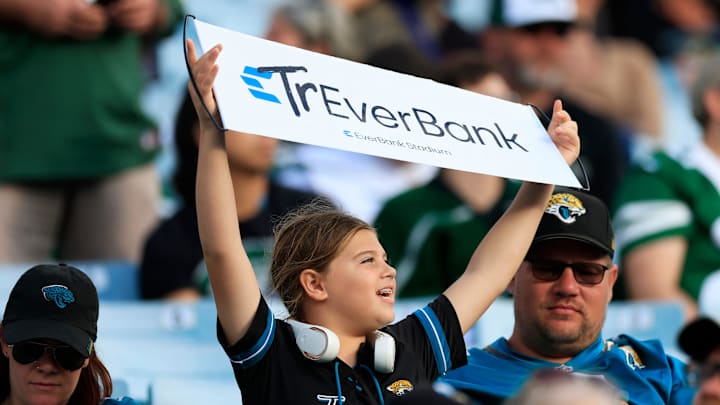 A Jacksonville Jaguars fan holds up a sign during the fourth quarter of an NFL football matchup at EverBank Stadium, Sunday, Dec. 14, 2025, in Jacksonville, Fla. The Jaguars defeated the Jets 48-20. [Corey Perrine/Florida Times-Union]