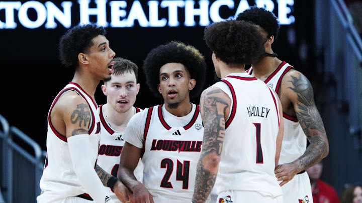 Louisville huddled during their game against Pitt at the KFC Yum! Center in Louisville, Ky. on Mar. 1, 2025.