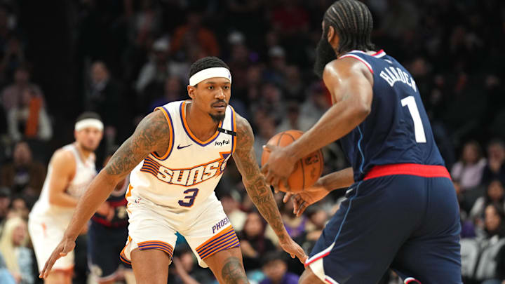 Jan 27, 2025; Phoenix, Arizona, USA; Phoenix Suns guard Bradley Beal (3) guards LA Clippers guard James Harden (1) during the second half at Footprint Center.