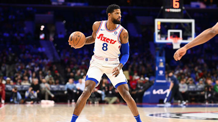 Feb 11, 2025; Philadelphia, Pennsylvania, USA; Philadelphia 76ers forward Paul George (8) controls the ball against the Toronto Raptors in the first quarter at Wells Fargo Center. Mandatory Credit: Kyle Ross-Imagn Images