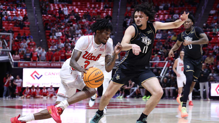 Feb 21, 2026; Salt Lake City, Utah, USA; Utah Utes guard Don McHenry (3) drives to the basket against UCF Knights guard Carmelo Pacheco (11) during the second half at Jon M. Huntsman Center. Mandatory Credit: Rob Gray-Imagn Images Feb 21, 2026; Salt Lake City, Utah, USA; Utah Utes guard Don McHenry (3) drives to the basket against UCF Knights guard Carmelo Pacheco (11) during the second half at Jon M. Huntsman Center. Mandatory Credit: Rob Gray-Imagn Images