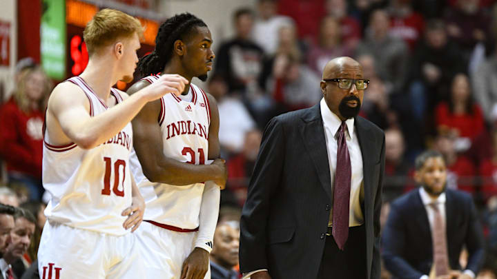 Indiana Hoosiers head coach Mike Woodson instructs his team as Indiana Hoosiers forward Luke Goode (10) and Indiana Hoosiers forward Mackenzie Mgbako (21) check in to the game during the second half against the Illinois Fighting Illini at Simon Skjodt Assembly Hall.
