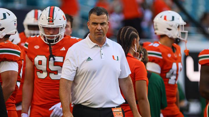 Sep 7, 2024; Miami Gardens, Florida, USA; Miami Hurricanes head coach Mario Cristobal walks on the field before the game against the Florida A&M Rattlers at Hard Rock Stadium. Mandatory Credit: Sam Navarro-Imagn Images