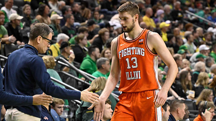 Jan 2, 2025; Eugene, Oregon, USA; Illinois Fighting Illini center Tomislav Ivisic (13) goes to the bench during the second half against the Oregon Ducks at Matthew Knight Arena. Mandatory Credit: Craig Strobeck-Imagn Images