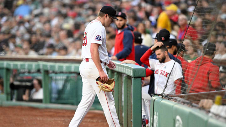 Jun 2, 2025; Boston, Massachusetts, USA; Boston Red Sox pitcher Richard Fitts (80) walks off of the field after the first inning of a game against the Los Angeles Angels at Fenway Park. Mandatory Credit: Brian Fluharty-Imagn Images