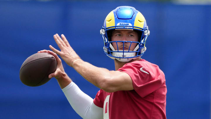 Jun 3, 2025; Woodland Hills, CA, USA; Los Angeles Rams quarterback Matthew Stafford (9) throws the ball during organized team activities at Rams Practice Facility. Mandatory Credit: Kirby Lee-Imagn Images