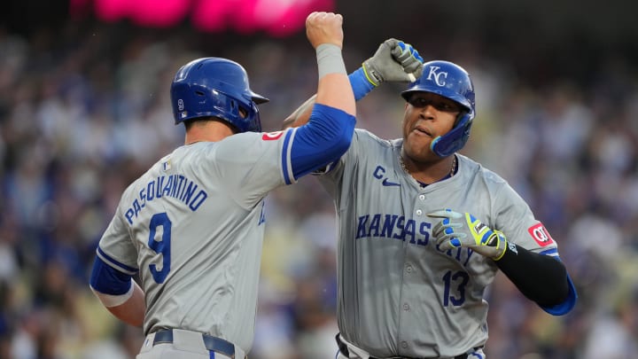 Jun 14, 2024; Los Angeles, California, USA; Kansas City Royals catcher Salvador Perez (13) celebrates with first baseman Vinnie Pasquantino (9) after hitting a three-run home run in the second inning against the Los Angeles Dodgers at Dodger Stadium. Mandatory Credit: Kirby Lee-USA TODAY Sports Jun 14, 2024; Los Angeles, California, USA; Kansas City Royals catcher Salvador Perez (13) celebrates with first baseman Vinnie Pasquantino (9) after hitting a three-run home run in the second inning against the Los Angeles Dodgers at Dodger Stadium. Mandatory Credit: Kirby Lee-USA TODAY Sports