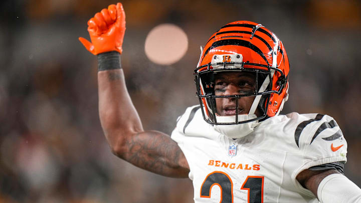 Cincinnati Bengals cornerback Mike Hilton (21) celebrates a stop in the fourth quarter of the NFL Week 18 game between the Pittsburgh Steelers and the Cincinnati Bengals at Acrisure Stadium in Pittsburgh on Saturday, Jan. 4, 2025. The Bengals won 19-17 to finish the regular season at 9-8. Cincinnati Bengals cornerback Mike Hilton (21) celebrates a stop in the fourth quarter of the NFL Week 18 game between the Pittsburgh Steelers and the Cincinnati Bengals at Acrisure Stadium in Pittsburgh on Saturday, Jan. 4, 2025. The Bengals won 19-17 to finish the regular season at 9-8.