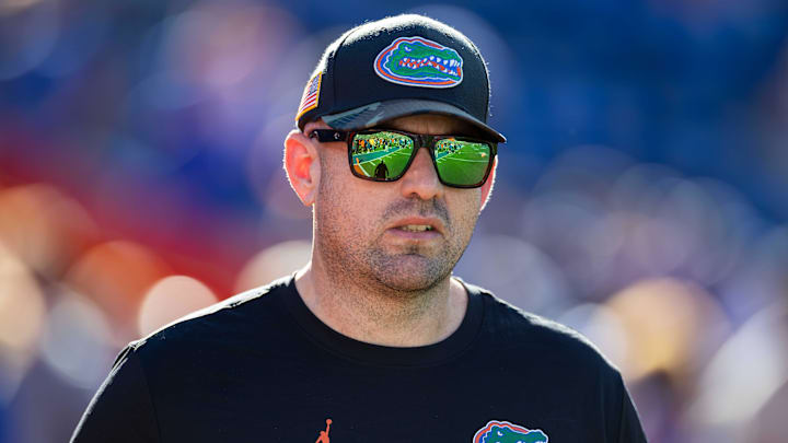 Nov 16, 2024; Gainesville, Florida, USA; Florida Gators co-offensive coordinator for offensive line Rob Sale walks on the field before a game against the LSU Tigers at Ben Hill Griffin Stadium. Mandatory Credit: Matt Pendleton-Imagn Images