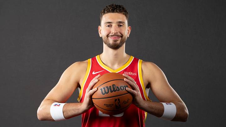 Sep 22, 2026; Houston, TX, USA;  Houston Rockets center Alperen Sengun (28) poses for a picture during media day at Hilton Americas hotel. Mandatory Credit: Troy Taormina-Imagn Images