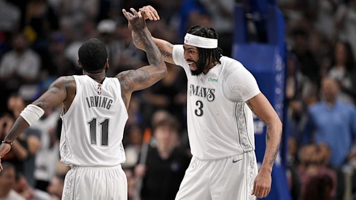 Feb 8, 2025; Dallas, Texas, USA; Dallas Mavericks forward Anthony Davis (3) and guard Kyrie Irving (11) celebrates after Davis dunks the ball during the game between the Dallas Mavericks and the Houston Rockets at the American Airlines Center. Mandatory Credit: Jerome Miron-Imagn Images