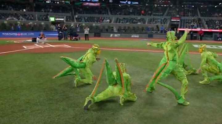 A group of people in cricket costumes throw the ceremonial first pitch before the Toronto Blue Jays game against the San Diego Padres. A group of people in cricket costumes throw the ceremonial first pitch before the Toronto Blue Jays game against the San Diego Padres.