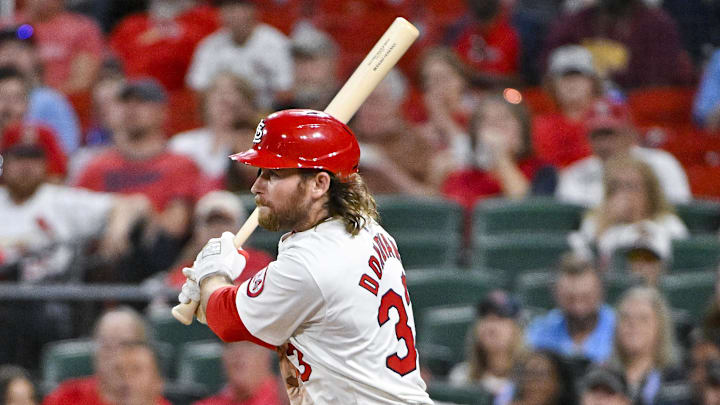 Sep 19, 2024; St. Louis, Missouri, USA;  St. Louis Cardinals second baseman Brendan Donovan (33) hits a one run single against the Pittsburgh Pirates during the fourth inning at Busch Stadium. Mandatory Credit: Jeff Curry-Imagn Images