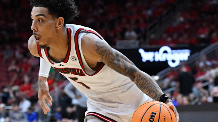 Nov 4, 2024; Louisville, Kentucky, USA;  Louisville Cardinals guard Terrence Edwards Jr. (5) dribbles during the second half against the Morehead State Eagles at KFC Yum! Center. Louisville defeated Morehead State 93-45. 