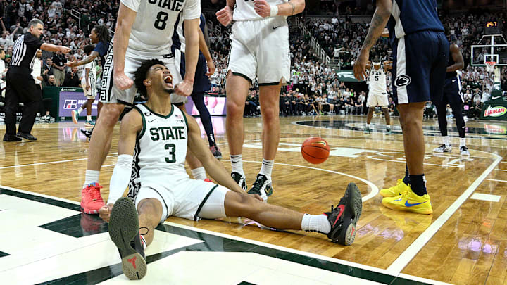 Jan 15, 2025; East Lansing, Michigan, USA;  Michigan State Spartans guard Jaden Akins (3) celebrates with  forward Frankie Fidler (8) and center Carson Cooper (15) after he scoring against the Penn State Nittany Lions during the second half at Jack Breslin Student Events Center.  Mandatory Credit: Dale Young-Imagn Images