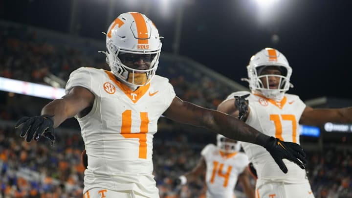 Tennessee wide receiver Mike Matthews (4) celebrates on the field during a NCAA football game against Kentucky at Kroger Field in Lexington, Kentucky on Oct. 25, 2025.