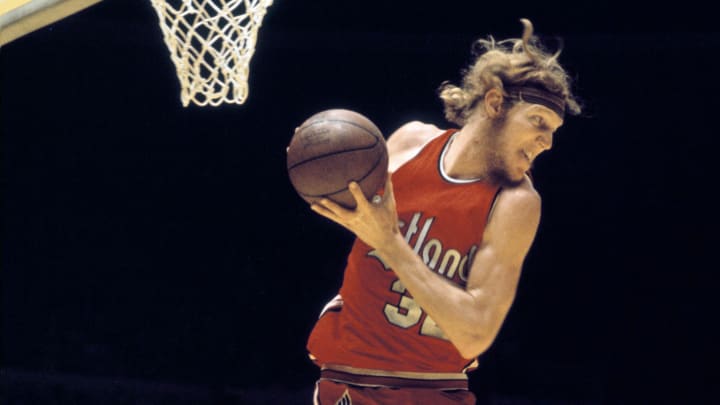 Unknown date; Los Angeles, CA, USA; FILE PHOTO; Portland Trailblazers center Bill Walton (32) pulls down a rebound against the Los Angeles Lakers at the Forum. Mandatory Credit: MPS-USA TODAY Sports