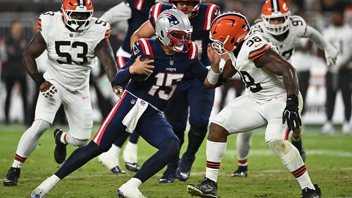 Aug 27, 2026; Cleveland, Ohio, USA; New England Patriots quarterback Behren Morton (15) runs the ball against Cleveland Browns defensive end Adin Huntington (98) during the first half at Huntington Bank Field. Mandatory Credit: Ken Blaze-Imagn Images Aug 27, 2026; Cleveland, Ohio, USA; New England Patriots quarterback Behren Morton (15) runs the ball against Cleveland Browns defensive end Adin Huntington (98) during the first half at Huntington Bank Field. Mandatory Credit: Ken Blaze-Imagn Images