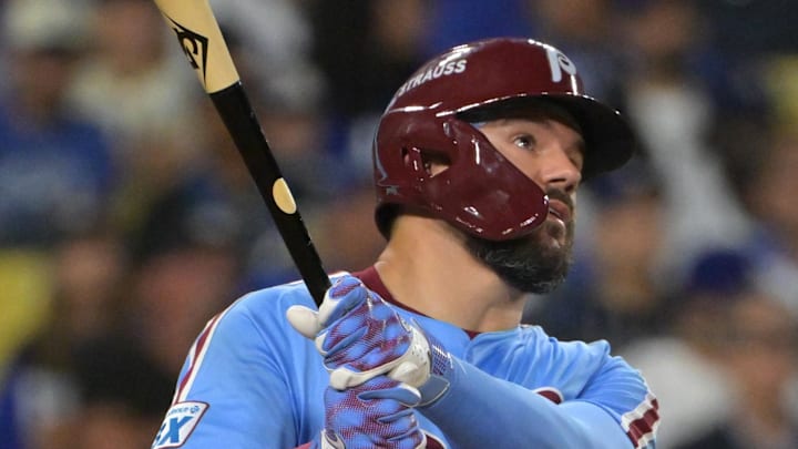 Oct 8, 2025; Los Angeles, California, USA; Philadelphia Phillies designated hitter Kyle Schwarber (12) watches the flight of the ball a solo home run during the fourth inning against the Los Angeles Dodgers in game three of the NLDS during the 2025 MLB playoffs at Dodger Stadium. Mandatory Credit: Jayne Kamin-Oncea-Imagn Images Oct 8, 2025; Los Angeles, California, USA; Philadelphia Phillies designated hitter Kyle Schwarber (12) watches the flight of the ball a solo home run during the fourth inning against the Los Angeles Dodgers in game three of the NLDS during the 2025 MLB playoffs at Dodger Stadium. Mandatory Credit: Jayne Kamin-Oncea-Imagn Images